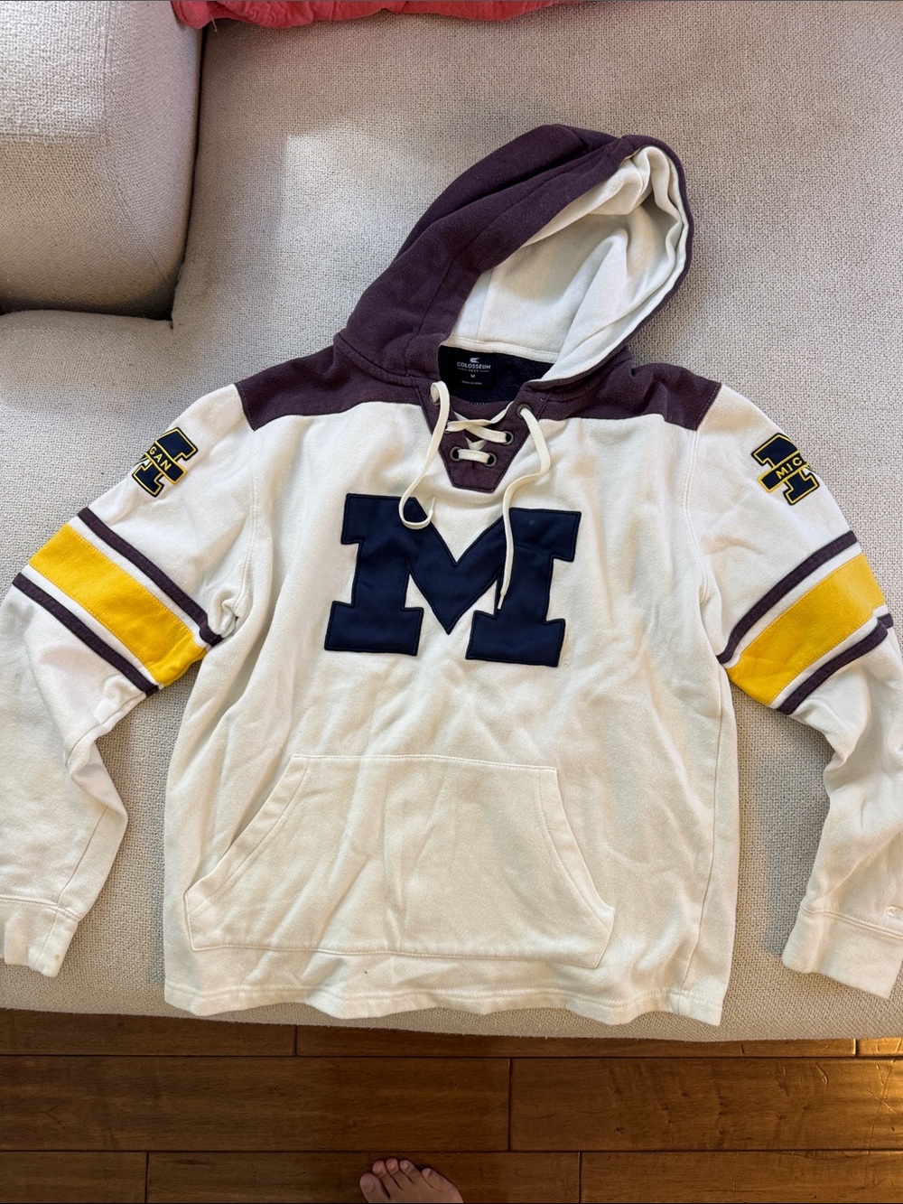 Colosseum MICHIGAN - Cream Lace-Up Hoodie with ‘M' Patch size Med heavily faded